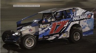 JANIAK WINS FIRST MODIFIED VICTORY